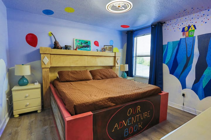Greetings fellow wilderness explorers! Ascend to the upstairs bedroom, where the waterfall and sky meet. Dream upon a custom king-sized "Adventure Book" bed, reliving Carl and Ellie's incredible journey. Balloons aren't included, but rumor has it tha