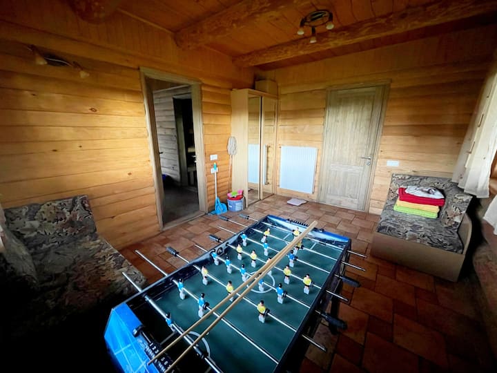 Game room with table hockey and novuss / sea billiards