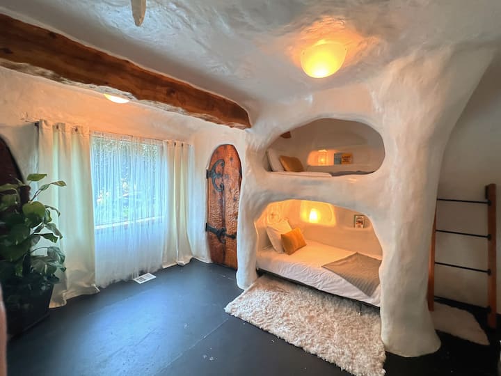Bunk bed is an understatement!  This second bedroom features twin over twin, hand carved, built in bunk beds with a ladder to climb up. So fun for any age!