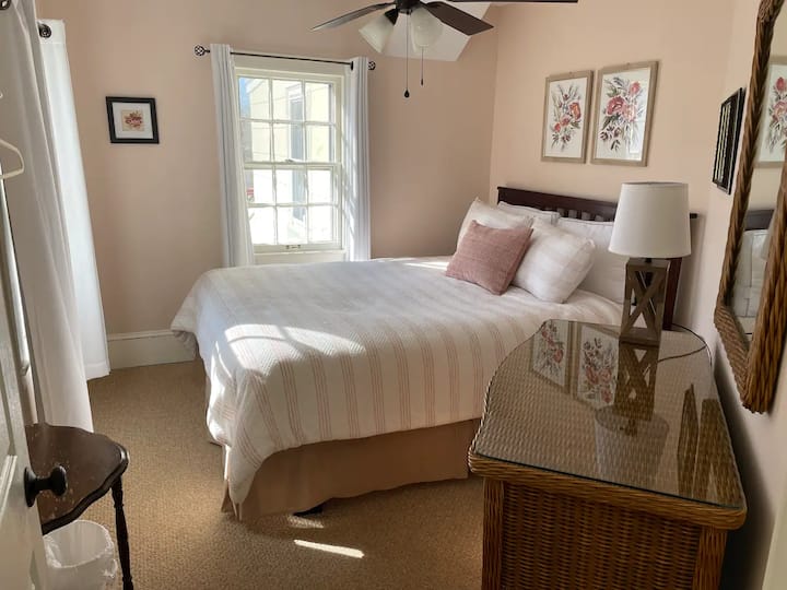 2nd floor bedroom. "The Rose Room" as the room was once covered in rose wallpaper, a piece of which is framed and hanging on the wall. It was quite dizzying!