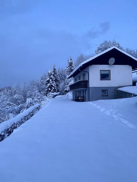 Lodge overlooking mountains, lakes and valley.