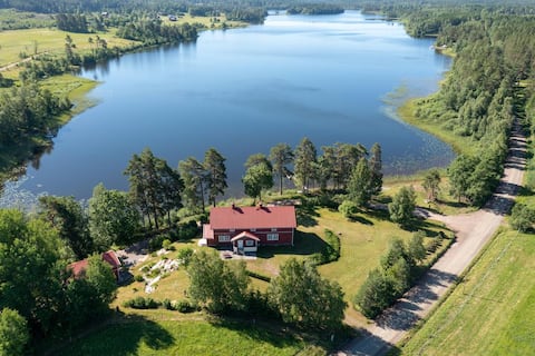 Large 1880 school-house by lake in scenic Varmland