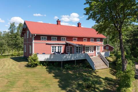 Large 1880 school-house by lake in scenic Varmland