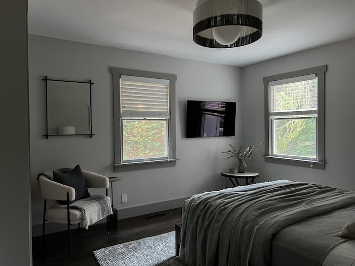 Guest bedroom #1 with tv.