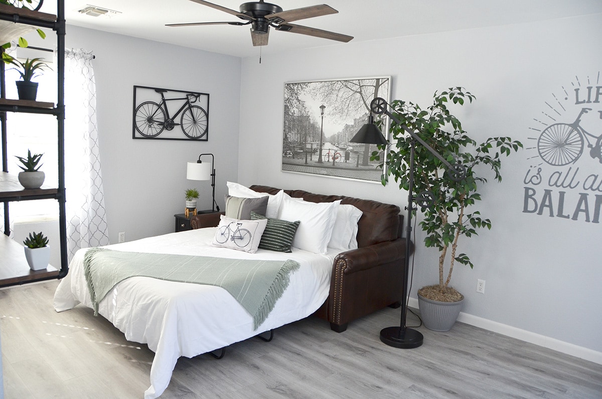 Two more guests can sleep in this Queen-sized bed, which is within the leather couch in the open loft/office space. This loft space is on the second floor.