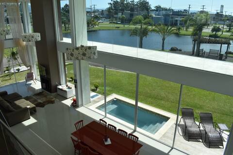 5-suite house and Dubai condo pool