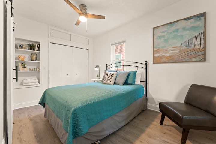 Main floor bedroom with attached bathroom