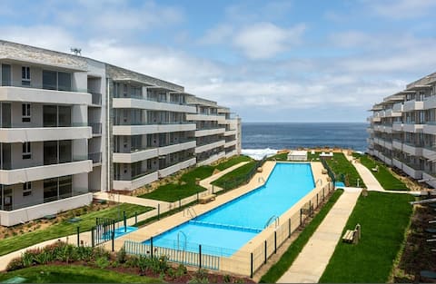 A comfortable apartment with ocean view and pool
