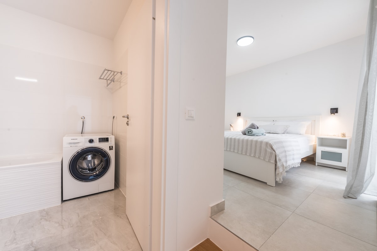 Laundry area image 1 at Apartment Festini – Spacious apartment in central Pag in Pag