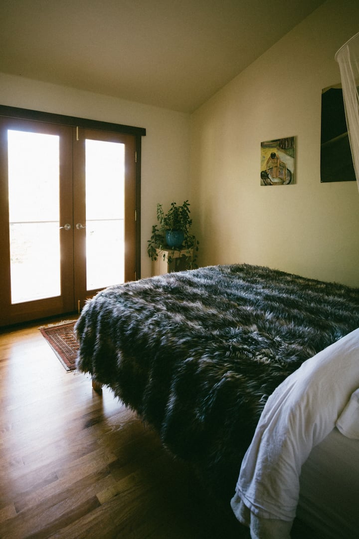 Bedroom 5: Queen bed with balcony