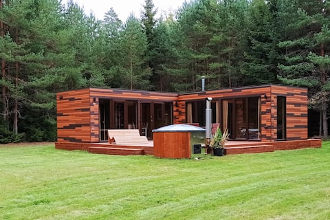 Greenery forest home with hot tubs and saunas