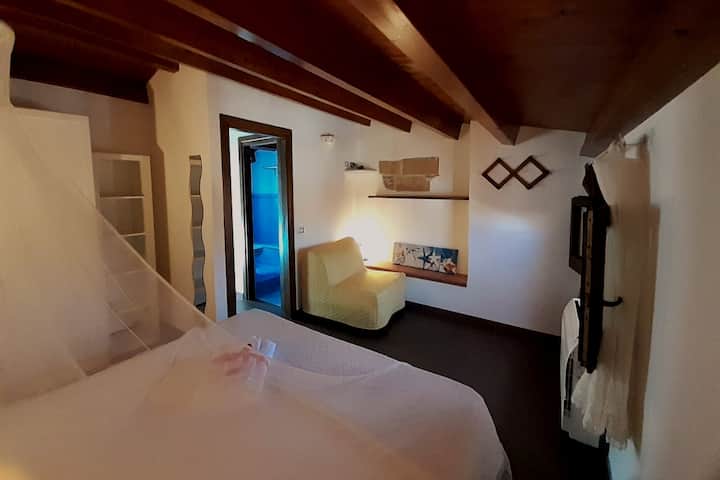 Bedroom with armchair-bed (single)