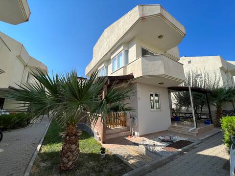 Seafront, complex, villa with garden