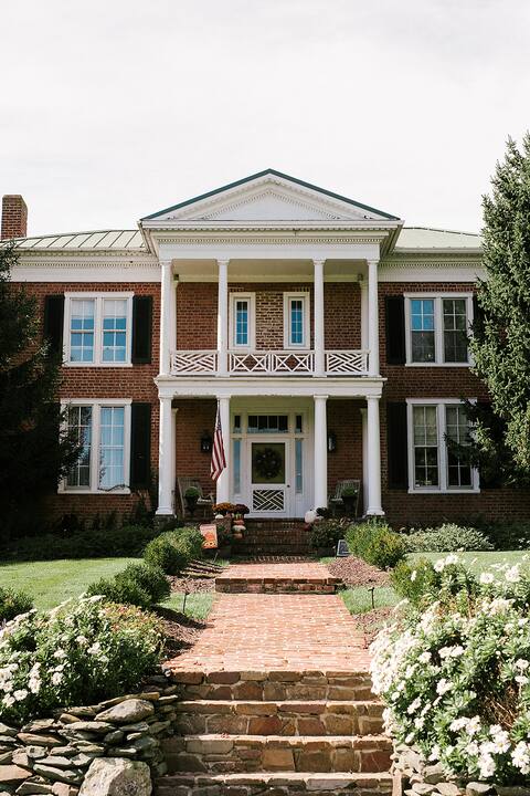 Large historic home on 7+ acres.