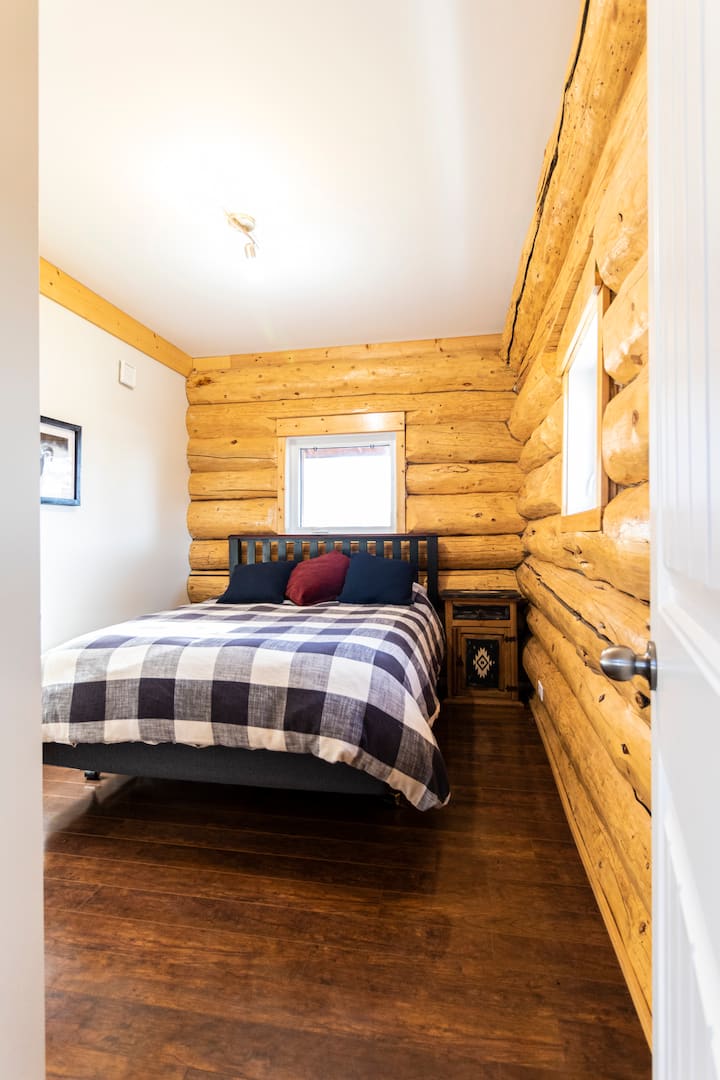 Second bedroom, queen bed. Located on main level.