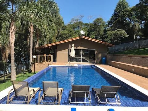 Waterfront farmhouse with pier and heated pool