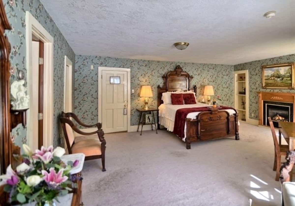 Grand guest room with fireplace