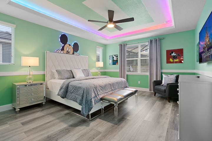 Mickey's Magical Retreat: Drift off to dreamland in the king-size bed under the watchful eye of the world's most famous mouse, Mickey, in a room where every detail is sprinkled with Disney magic.  
