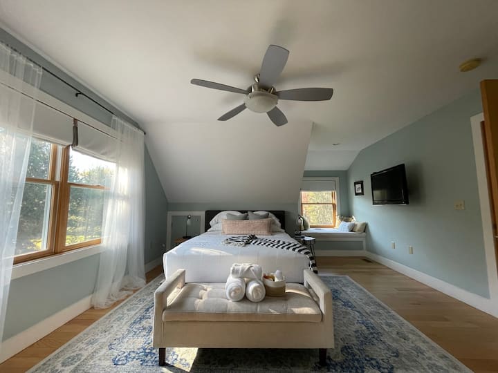 Bedroom #4: 2nd Floor Blue Bedroom with Queen size bed, window bench, seating alcove, closet and storage shelves, Roku TV