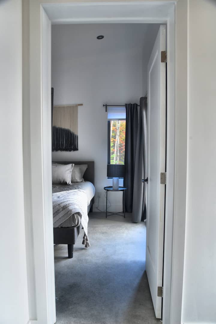 Bedroom 1 is conveniently located near the main living spaces while offering a quiet place to unwind.
