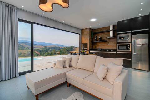 Mountainhouse with swimming pool, fireplace and bathtub