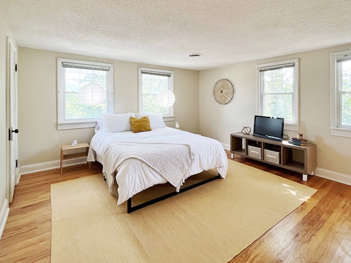 Upstairs bedroom with queen bed and adjoining bathroom