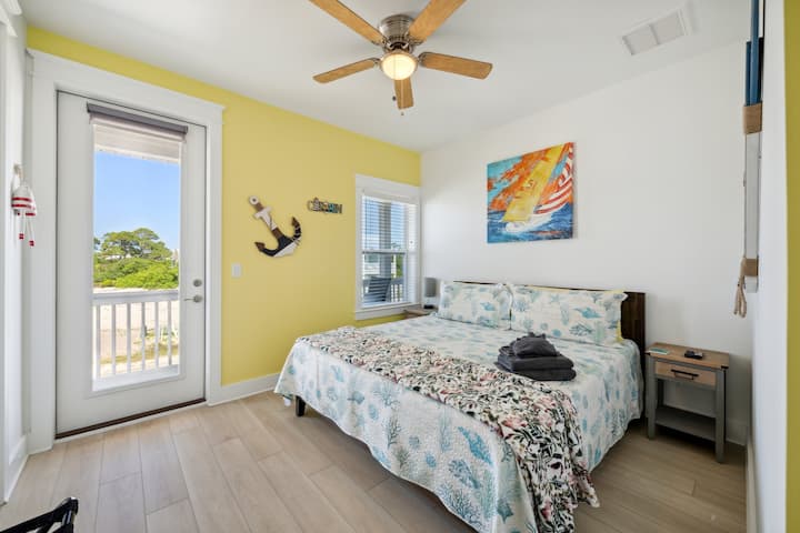 Sail away to Dream land full of calm and tranquility in this stunning sailing-themed bedroom. The room features nautical decor, comfortable furnishings, and crisp linens, creating a peaceful and rejuvenating space. 