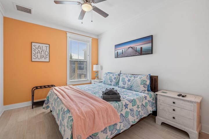 Experience luxury and comfort in our spacious bedroom with a plush king bed. You'll love snuggling up in the soft linens and sinking into the plush mattress after a long day of exploring. With plenty of natural light and a peaceful atmosphere.