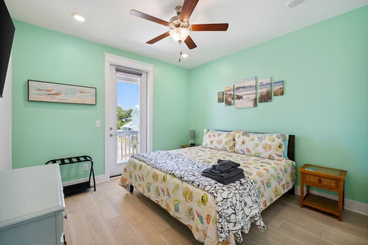 While all the bedrooms have king beds, ceiling fans and views.  The master bedroom upstairs also has an en-suite bath and easy access to the covered (west facing = Sunsets) balcony to wind down after a long day. 