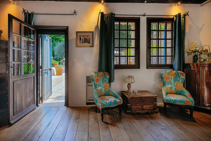 The lounge area in the master suite with a view of the private terrace