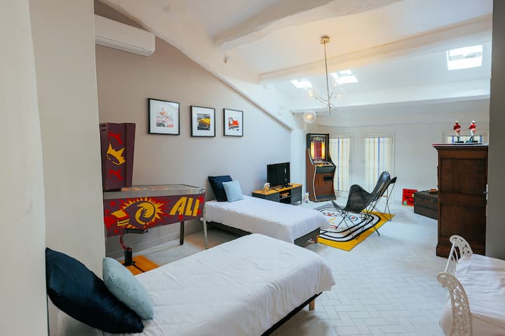 The dormitory/games room with 4 single beds
