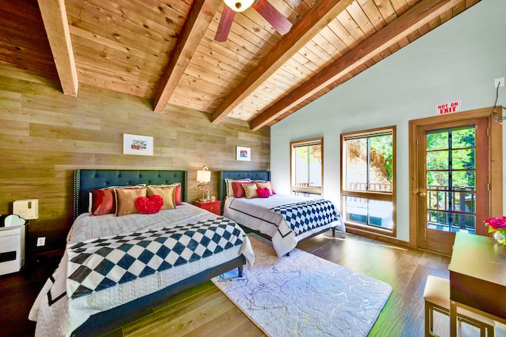 At the top of the stars open the double doors into our large Queen of Hearts room. Complete with 2   gel memory foam queen size beds, a lite vanity, full length mirror and electric fireplace. This is an amazing room to relax in; it also has its own private balcony complete with seating and loungers.