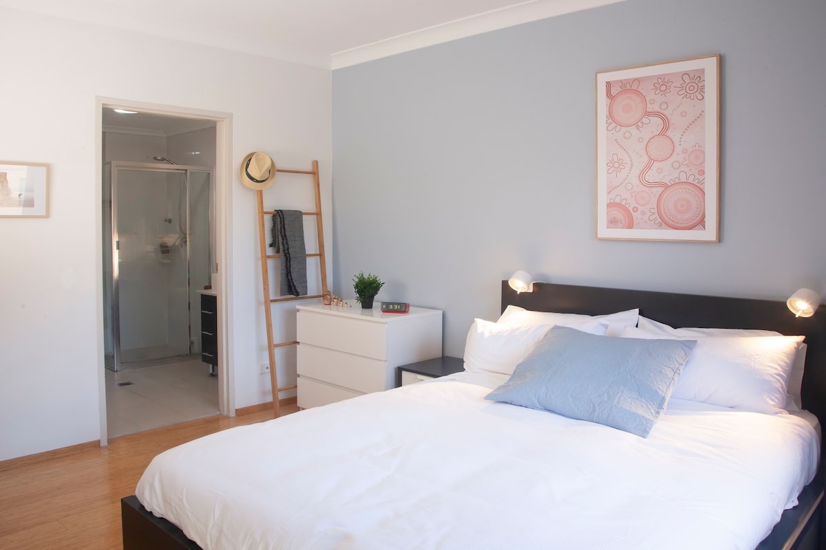 Spacious master bedroom with en suite and large wardrobe.