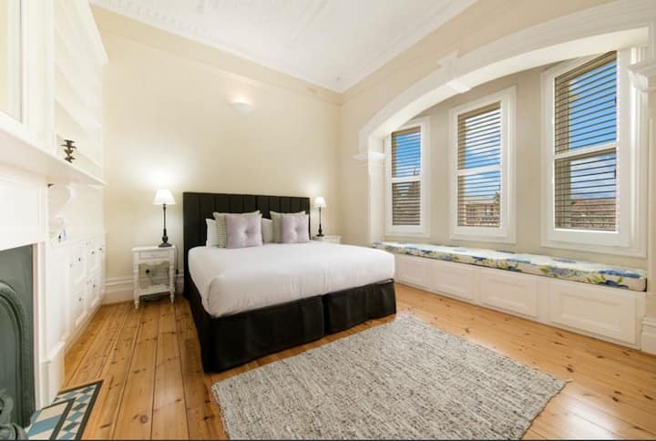 Our favourite bedroom with stunning bay window and window seat. Can be split into twin singles.