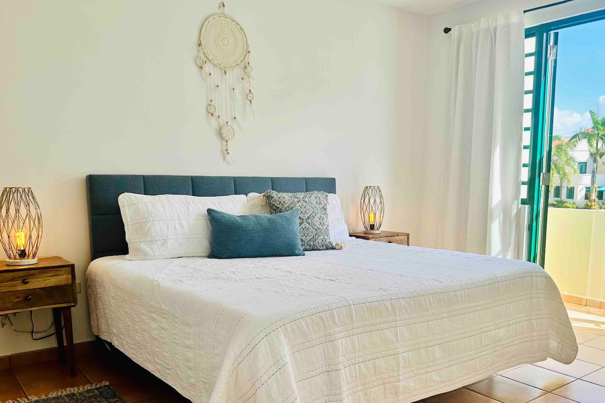 Comfy king size bed with memory foam mattress for resting and recharging during your stay