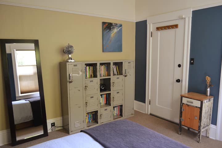 Funky upcycled gym lockers holds books and misc storage (yoga mats, fire pit blankets, umbrellas, etc)