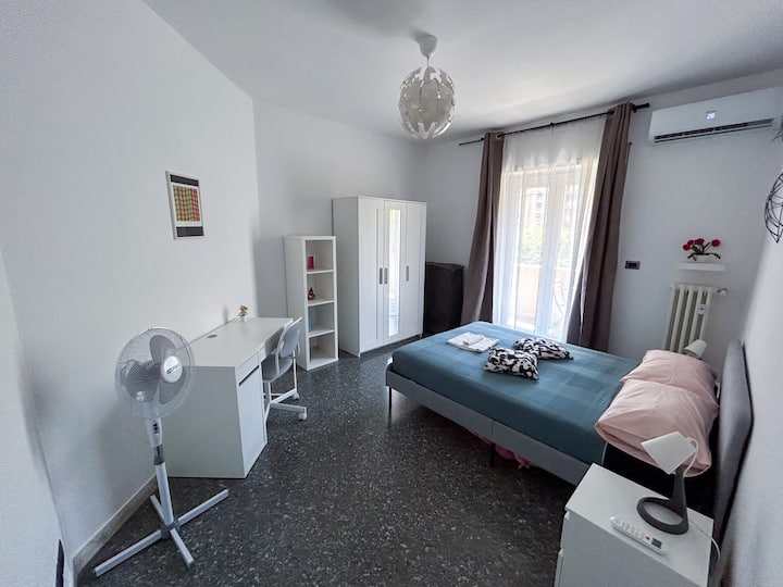 First double room with a balcony, fan and air conditioning.