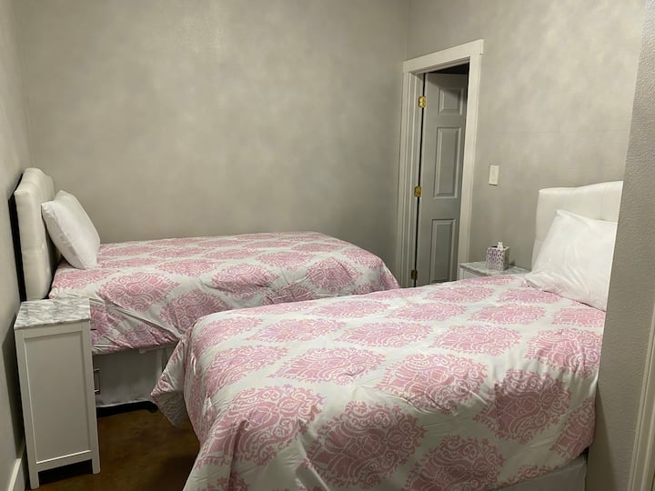 This delightful bedroom is on the first floor and has 2 twin beds. This room shares a full bathroom with another room.