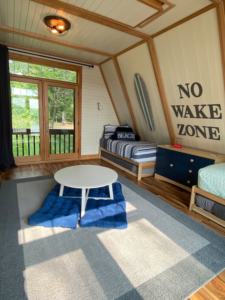 Bedroom 3/loft area. These are trundle beds so this room sleeps 4 on single beds. Note: this room is accessed via a spiral staircase (shown in another photo). Please consider this prior to booking if this is a concern. 
