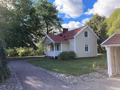 Cozy little house with beautiful surroundings.