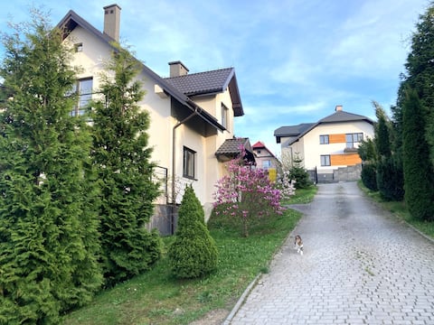 Tymi3 House on a hill by a slope