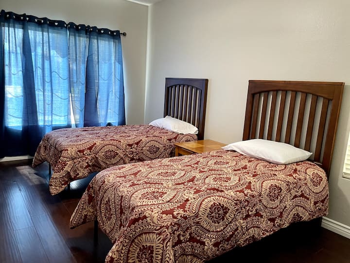 4th bedroom with 2 twins and a dresser