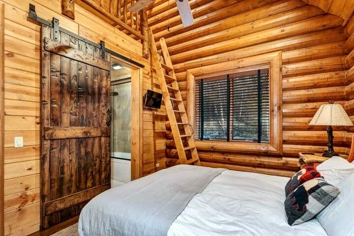 Queen size bed, bathroom and 2 beds on the space up the stairs, 1st floor