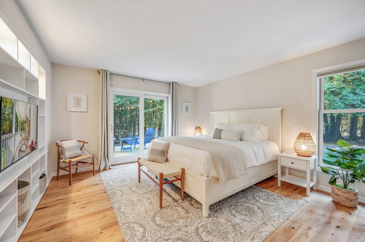 First floor master bedroom with King bed, Smart TV, full length mirror and blackout blinds