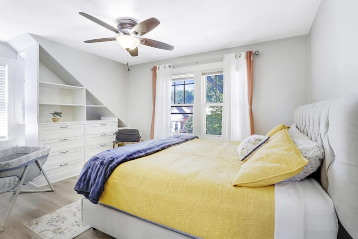 Unwind in this serene bedroom, complete with convenient built-ins and a warm, inviting atmosphere.
