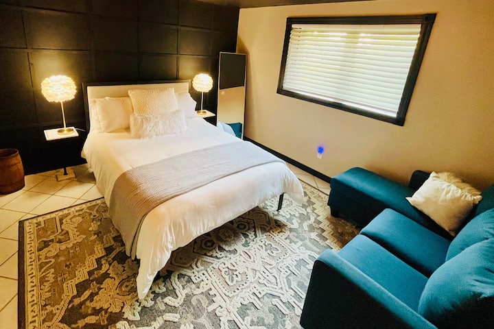 3rd Bedroom in lower level with Queen bed and couch.  