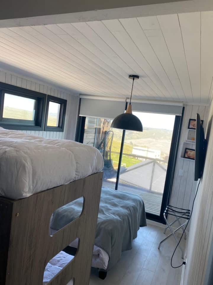 Chumba cha familia pia chenye mandhari ya bahari