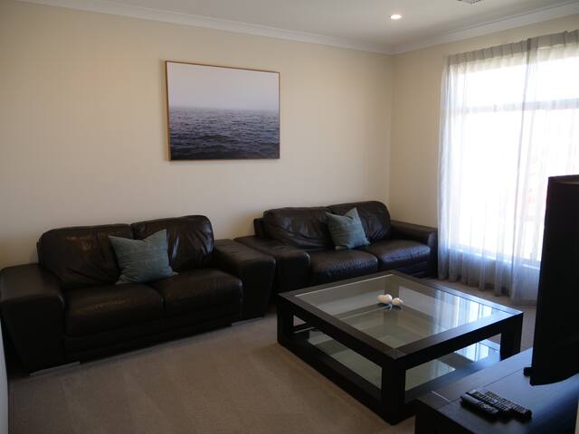 Leisure beach front home with a fully tiled pool. gallery image 5