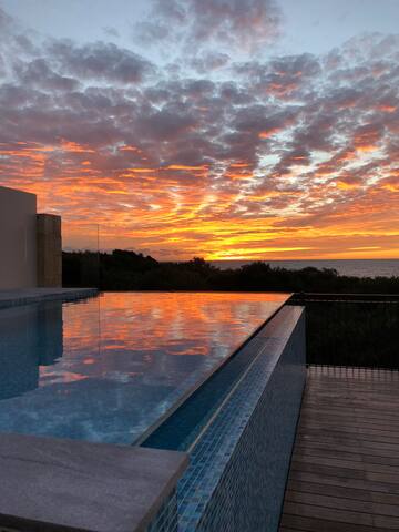 Leisure beach front home with a fully tiled pool. gallery image 3