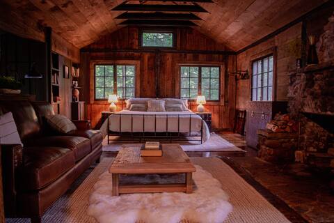 Escape to a renovated 130 y.o. cabin on 850 acres.